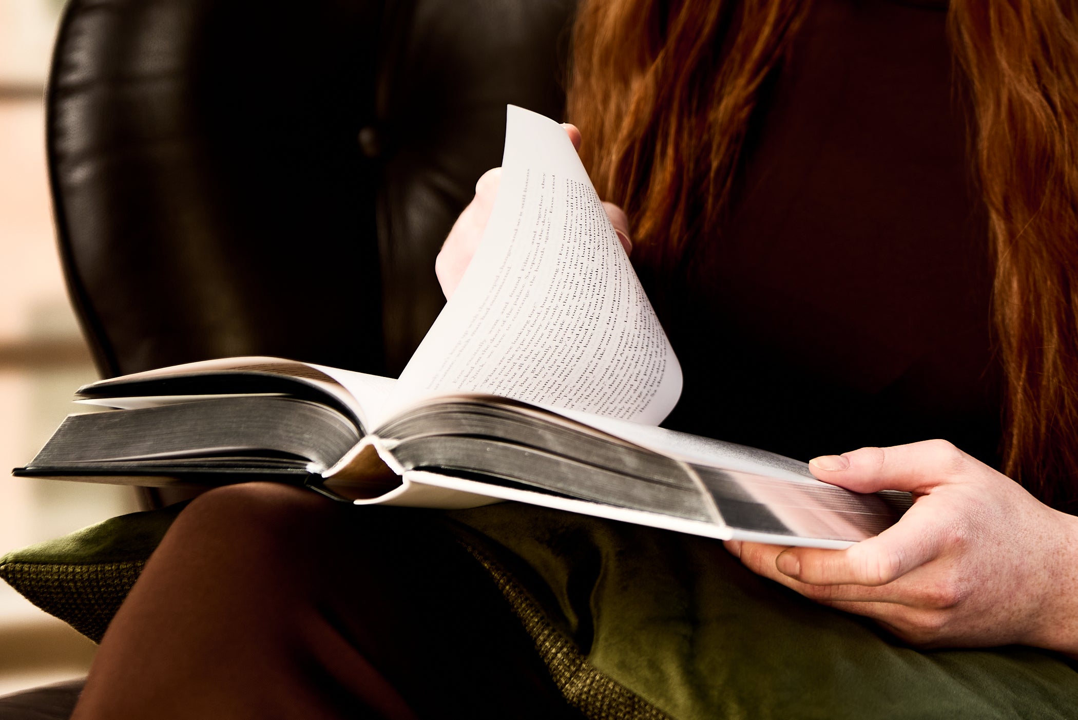 Person reading a book